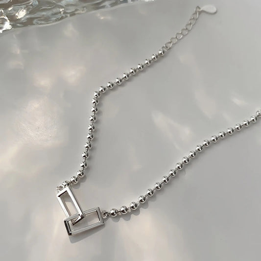 Cadenas con Alma: Pulsera en Plata con Eslabones de Patrones Variados
