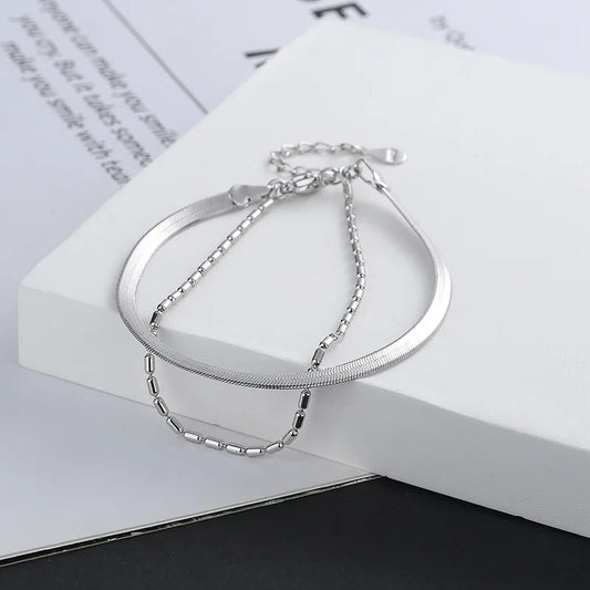 Cadenas con Alma: Pulsera en Plata con Eslabones de Patrones Variados