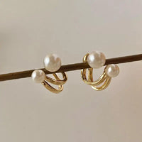 Toque de Perla: Pendientes con Perlas en las Extremidades