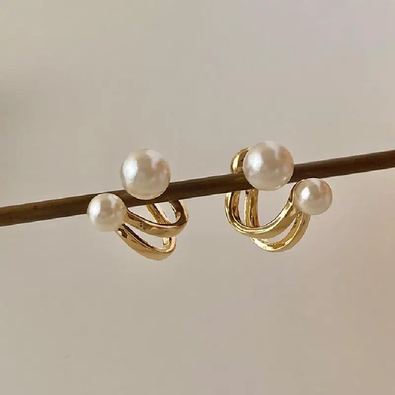 Toque de Perla: Pendientes con Perlas en las Extremidades