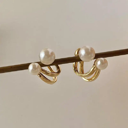 Toque de Perla: Pendientes con Perlas en las Extremidades