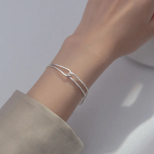 Cadenas con Alma: Pulsera en Plata con Eslabones de Patrones Variados