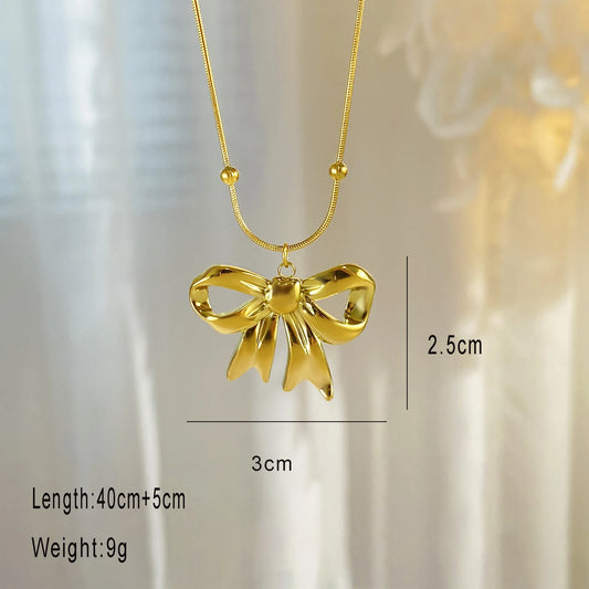 Lazo Dorado: Collar con Colgante en Forma de Moño