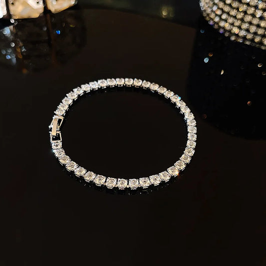 Brillo a Tu Ritmo: Pulsera Ajustable en Plata u Oro con Zirconias de Fantasía