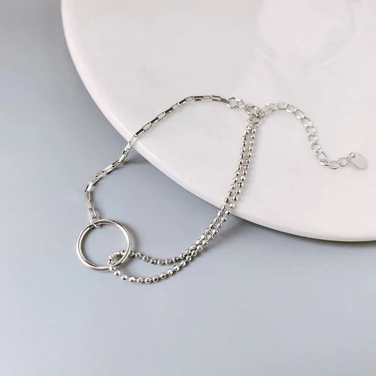 Cadenas con Alma: Pulsera en Plata con Eslabones de Patrones Variados