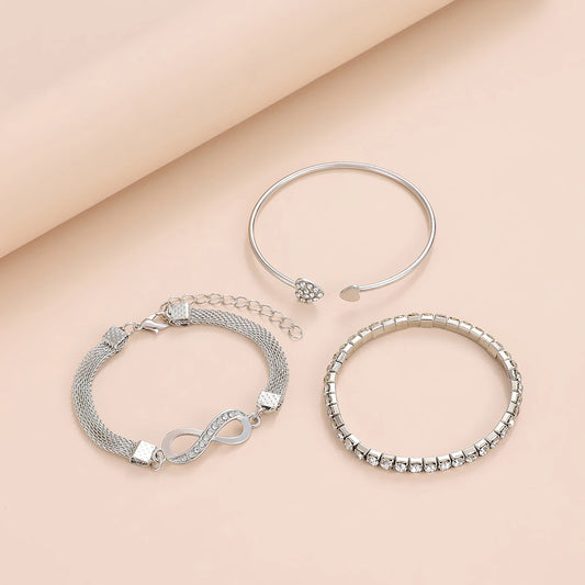 Trilogía de Amor: Set de 3 Pulseras en Plata u Oro con Infinito, Tennis y Corazones