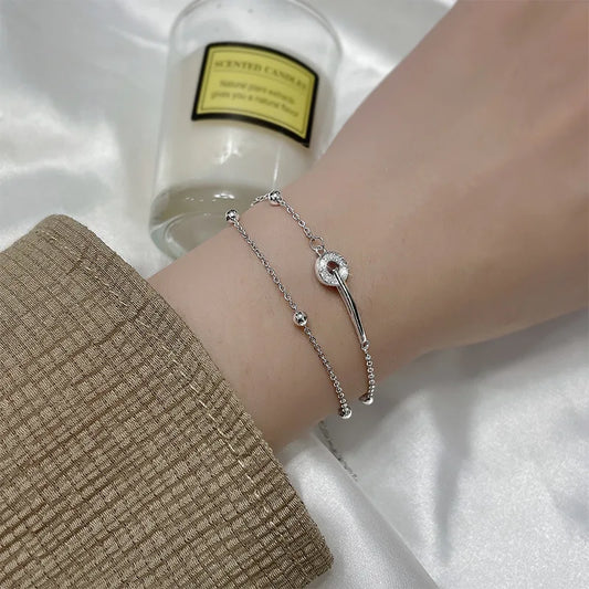 Cadenas con Alma: Pulsera en Plata con Eslabones de Patrones Variados
