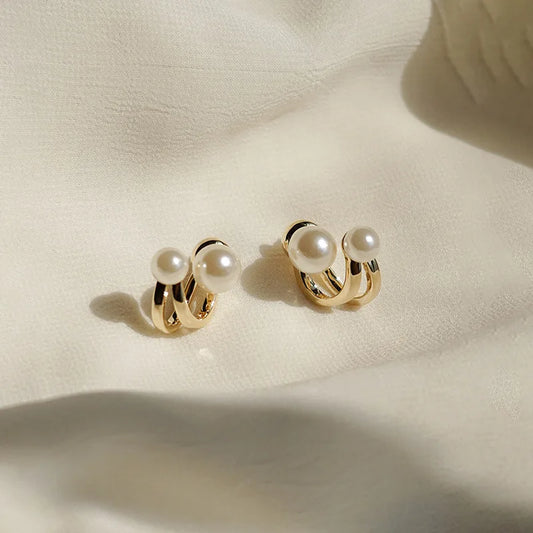 Toque de Perla: Pendientes con Perlas en las Extremidades