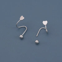 Brillo con Intención: Mini Studs con Corazón o Estrella en Plata