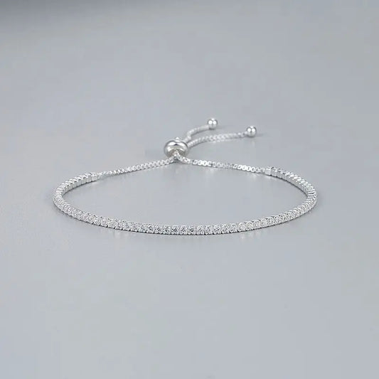 Encaje Perfecto: Pulsera Ajustable en Plata con Zirconias