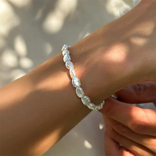 Título: "Perlas en Armonía: Choker o Pulsera de Estilo Refinado