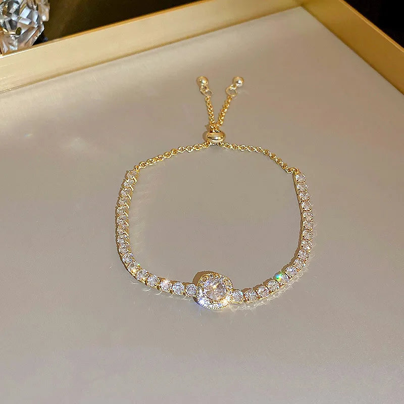 Brillo a Tu Ritmo: Pulsera Ajustable en Plata u Oro con Zirconias de Fantasía
