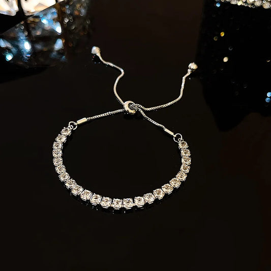 Brillo a Tu Ritmo: Pulsera Ajustable en Plata u Oro con Zirconias de Fantasía