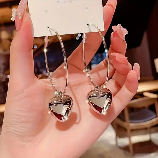 Latido Dorado: Aros en Plata u Oro con Dije de Corazón